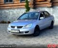 Сірий Міцубісі Lancer, об'ємом двигуна 1.6 л та пробігом 220 тис. км за 3650 $, фото 1 на Automoto.ua