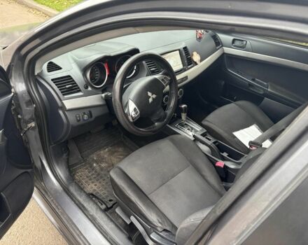 Серый Мицубиси Лансер, объемом двигателя 2 л и пробегом 240 тыс. км за 5450 $, фото 4 на Automoto.ua