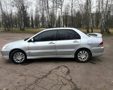 Сірий Міцубісі Lancer, об'ємом двигуна 1.6 л та пробігом 254 тис. км за 3800 $, фото 7 на Automoto.ua