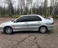 Сірий Міцубісі Lancer, об'ємом двигуна 1.6 л та пробігом 254 тис. км за 3800 $, фото 7 на Automoto.ua