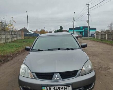 Сірий Міцубісі Lancer, об'ємом двигуна 1.58 л та пробігом 1 тис. км за 2850 $, фото 9 на Automoto.ua