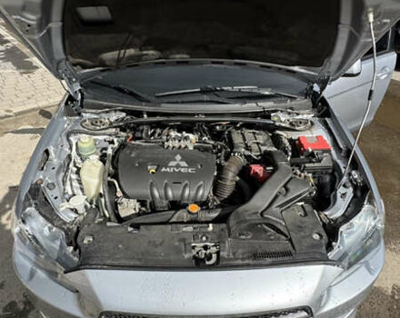 Серый Мицубиси Лансер, объемом двигателя 2 л и пробегом 190 тыс. км за 6900 $, фото 31 на Automoto.ua