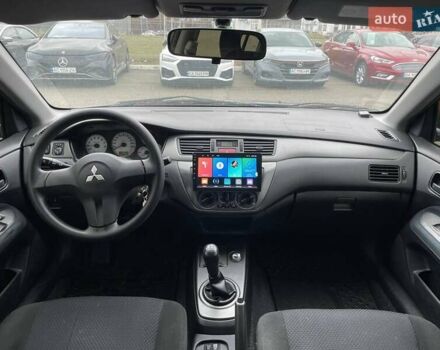 Серый Мицубиси Лансер, объемом двигателя 1.58 л и пробегом 146 тыс. км за 5490 $, фото 12 на Automoto.ua