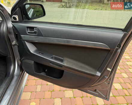 Сірий Міцубісі Lancer, об'ємом двигуна 2 л та пробігом 92 тис. км за 8200 $, фото 29 на Automoto.ua