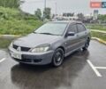 Сірий Міцубісі Lancer, об'ємом двигуна 1.58 л та пробігом 245 тис. км за 2650 $, фото 1 на Automoto.ua