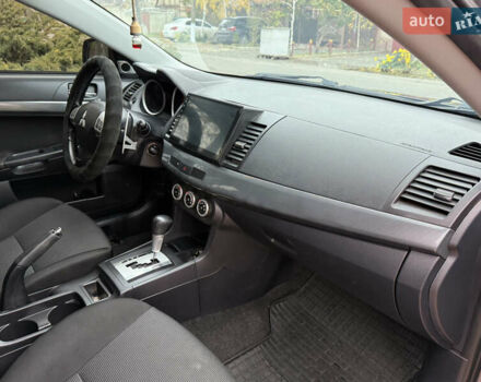 Сірий Міцубісі Lancer, об'ємом двигуна 2 л та пробігом 92 тис. км за 8200 $, фото 30 на Automoto.ua