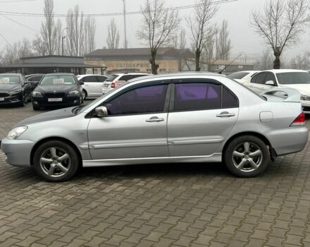 Серый Мицубиси Лансер, объемом двигателя 1.6 л и пробегом 205 тыс. км за 5400 $, фото 3 на Automoto.ua