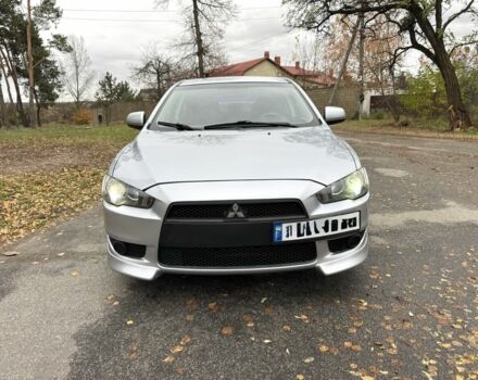 Серый Мицубиси Лансер, объемом двигателя 2 л и пробегом 225 тыс. км за 6890 $, фото 1 на Automoto.ua