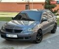 Серый Мицубиси Лансер, объемом двигателя 1.6 л и пробегом 260 тыс. км за 3500 $, фото 1 на Automoto.ua