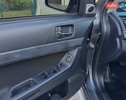 Сірий Міцубісі Lancer, об'ємом двигуна 2 л та пробігом 92 тис. км за 9800 $, фото 85 на Automoto.ua