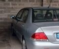 Серый Мицубиси Лансер, объемом двигателя 1.58 л и пробегом 89 тыс. км за 7500 $, фото 1 на Automoto.ua