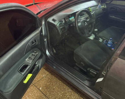 Серый Мицубиси Лансер, объемом двигателя 1.6 л и пробегом 268 тыс. км за 4600 $, фото 13 на Automoto.ua