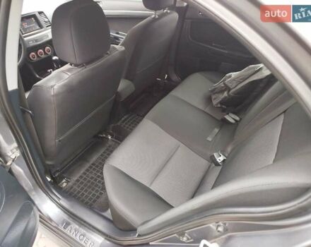 Міцубісі Lancer 2008 у Хмельницькому на Automoto.ua Сірий Міцубісі Lancer, об'ємом двигуна 2 л та пробігом 157 тис. км за 6300 $, фото 69 на Automoto.ua