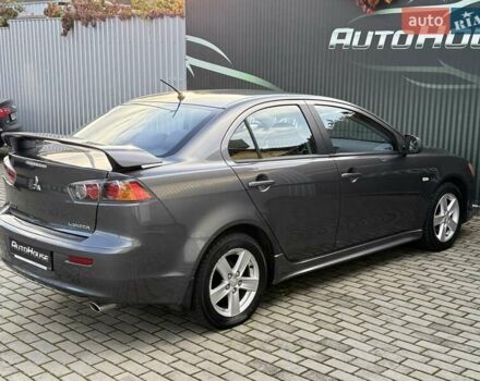 Серый Мицубиси Лансер, объемом двигателя 2 л и пробегом 230 тыс. км за 6900 $, фото 21 на Automoto.ua