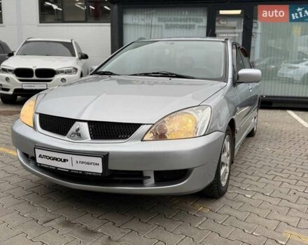 Сірий Міцубісі Lancer, об'ємом двигуна 1.6 л та пробігом 206 тис. км за 4799 $, фото 2 на Automoto.ua