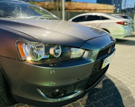 Сірий Міцубісі Lancer, об'ємом двигуна 2 л та пробігом 220 тис. км за 4750 $, фото 4 на Automoto.ua