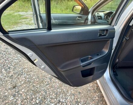 Серый Мицубиси Лансер, объемом двигателя 2 л и пробегом 223 тыс. км за 6890 $, фото 14 на Automoto.ua