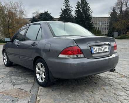 Серый Мицубиси Лансер, объемом двигателя 1.6 л и пробегом 222 тыс. км за 5200 $, фото 11 на Automoto.ua