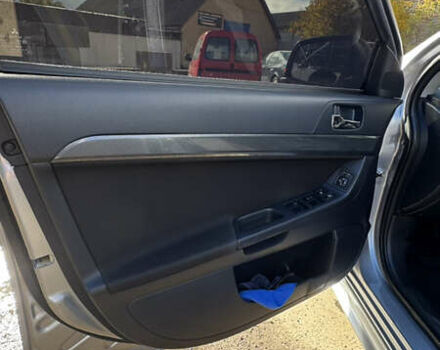 Серый Мицубиси Лансер, объемом двигателя 2 л и пробегом 190 тыс. км за 6900 $, фото 10 на Automoto.ua