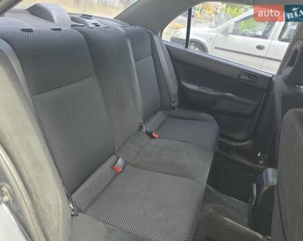 Сірий Міцубісі Lancer, об'ємом двигуна 1.58 л та пробігом 298 тис. км за 3400 $, фото 7 на Automoto.ua
