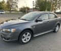 Сірий Міцубісі Lancer, об'ємом двигуна 2 л та пробігом 219 тис. км за 6700 $, фото 1 на Automoto.ua