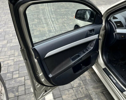 Сірий Міцубісі Lancer, об'ємом двигуна 2 л та пробігом 230 тис. км за 6800 $, фото 16 на Automoto.ua