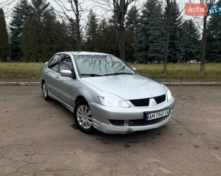 Сірий Міцубісі Lancer, об'ємом двигуна 1.6 л та пробігом 254 тис. км за 3800 $, фото 2 на Automoto.ua