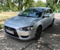 Сірий Міцубісі Lancer, об'ємом двигуна 1 л та пробігом 2 тис. км за 6900 $, фото 1 на Automoto.ua