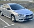Серый Мицубиси Лансер, объемом двигателя 2 л и пробегом 253 тыс. км за 3799 $, фото 1 на Automoto.ua