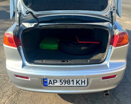 Серый Мицубиси Лансер, объемом двигателя 2 л и пробегом 151 тыс. км за 6099 $, фото 6 на Automoto.ua