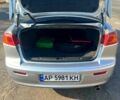 Серый Мицубиси Лансер, объемом двигателя 2 л и пробегом 151 тыс. км за 6099 $, фото 6 на Automoto.ua