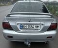 Сірий Міцубісі Lancer, об'ємом двигуна 1.6 л та пробігом 222 тис. км за 4300 $, фото 3 на Automoto.ua