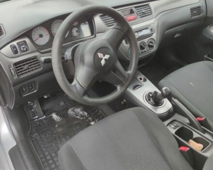 Серый Мицубиси Лансер, объемом двигателя 1.6 л и пробегом 225 тыс. км за 3100 $, фото 5 на Automoto.ua