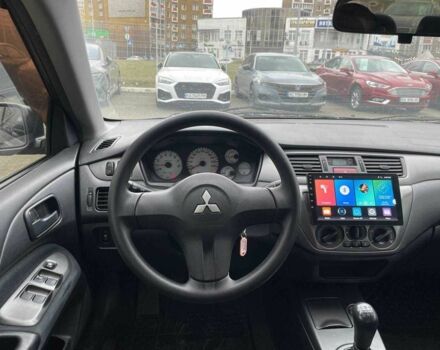 Серый Мицубиси Лансер, объемом двигателя 1.6 л и пробегом 146 тыс. км за 5990 $, фото 12 на Automoto.ua