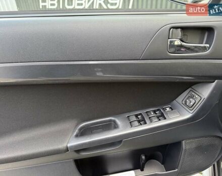 Серый Мицубиси Лансер, объемом двигателя 2 л и пробегом 230 тыс. км за 6900 $, фото 42 на Automoto.ua