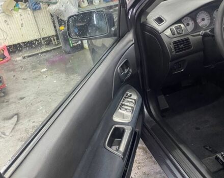 Серый Мицубиси Лансер, объемом двигателя 1.6 л и пробегом 100 тыс. км за 2500 $, фото 10 на Automoto.ua