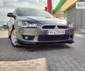 Сірий Міцубісі Lancer, об'ємом двигуна 2 л та пробігом 221 тис. км за 7100 $, фото 24 на Automoto.ua