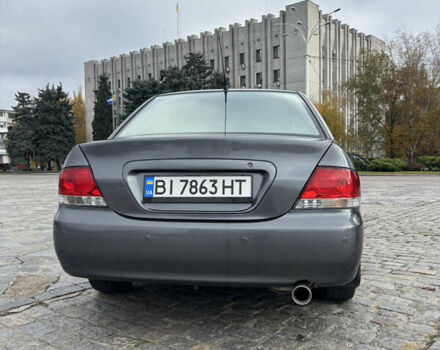 Серый Мицубиси Лансер, объемом двигателя 1.6 л и пробегом 222 тыс. км за 5200 $, фото 10 на Automoto.ua