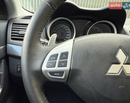 Серый Мицубиси Лансер, объемом двигателя 2 л и пробегом 230 тыс. км за 6900 $, фото 39 на Automoto.ua