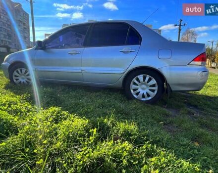Сірий Міцубісі Lancer, об'ємом двигуна 1.6 л та пробігом 364 тис. км за 4300 $, фото 6 на Automoto.ua