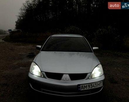 Серый Мицубиси Лансер, объемом двигателя 1.58 л и пробегом 268 тыс. км за 3450 $, фото 9 на Automoto.ua