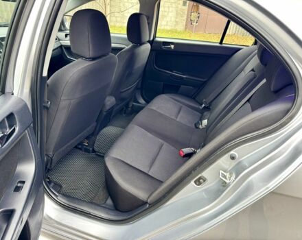 Серый Мицубиси Лансер, объемом двигателя 2 л и пробегом 225 тыс. км за 6890 $, фото 11 на Automoto.ua