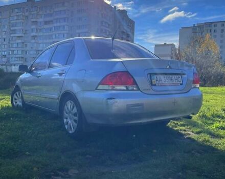 Сірий Міцубісі Lancer, об'ємом двигуна 1.6 л та пробігом 364 тис. км за 4300 $, фото 7 на Automoto.ua
