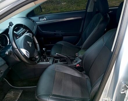 Серый Мицубиси Лансер, объемом двигателя 2 л и пробегом 243 тыс. км за 5500 $, фото 10 на Automoto.ua