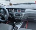 Серый Мицубиси Лансер, объемом двигателя 1.58 л и пробегом 155 тыс. км за 6000 $, фото 6 на Automoto.ua