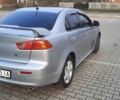 Серый Мицубиси Лансер, объемом двигателя 2 л и пробегом 181 тыс. км за 7499 $, фото 4 на Automoto.ua