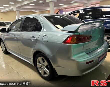 Серый Мицубиси Лансер, объемом двигателя 1.5 л и пробегом 241 тыс. км за 6400 $, фото 1 на Automoto.ua