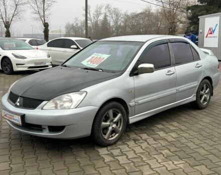 Серый Мицубиси Лансер, объемом двигателя 1.6 л и пробегом 205 тыс. км за 5400 $, фото 2 на Automoto.ua