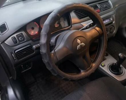 Сірий Міцубісі Lancer, об'ємом двигуна 1.6 л та пробігом 250 тис. км за 3500 $, фото 3 на Automoto.ua