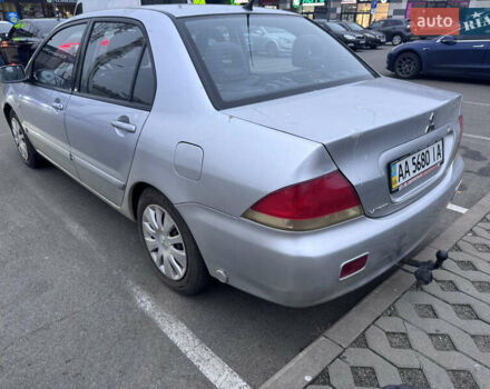 Серый Мицубиси Лансер, объемом двигателя 1.58 л и пробегом 330 тыс. км за 3500 $, фото 14 на Automoto.ua